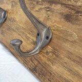 Teak coat rack with 8 double cast iron hooks