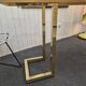 Vintage brass and smoked glass console.