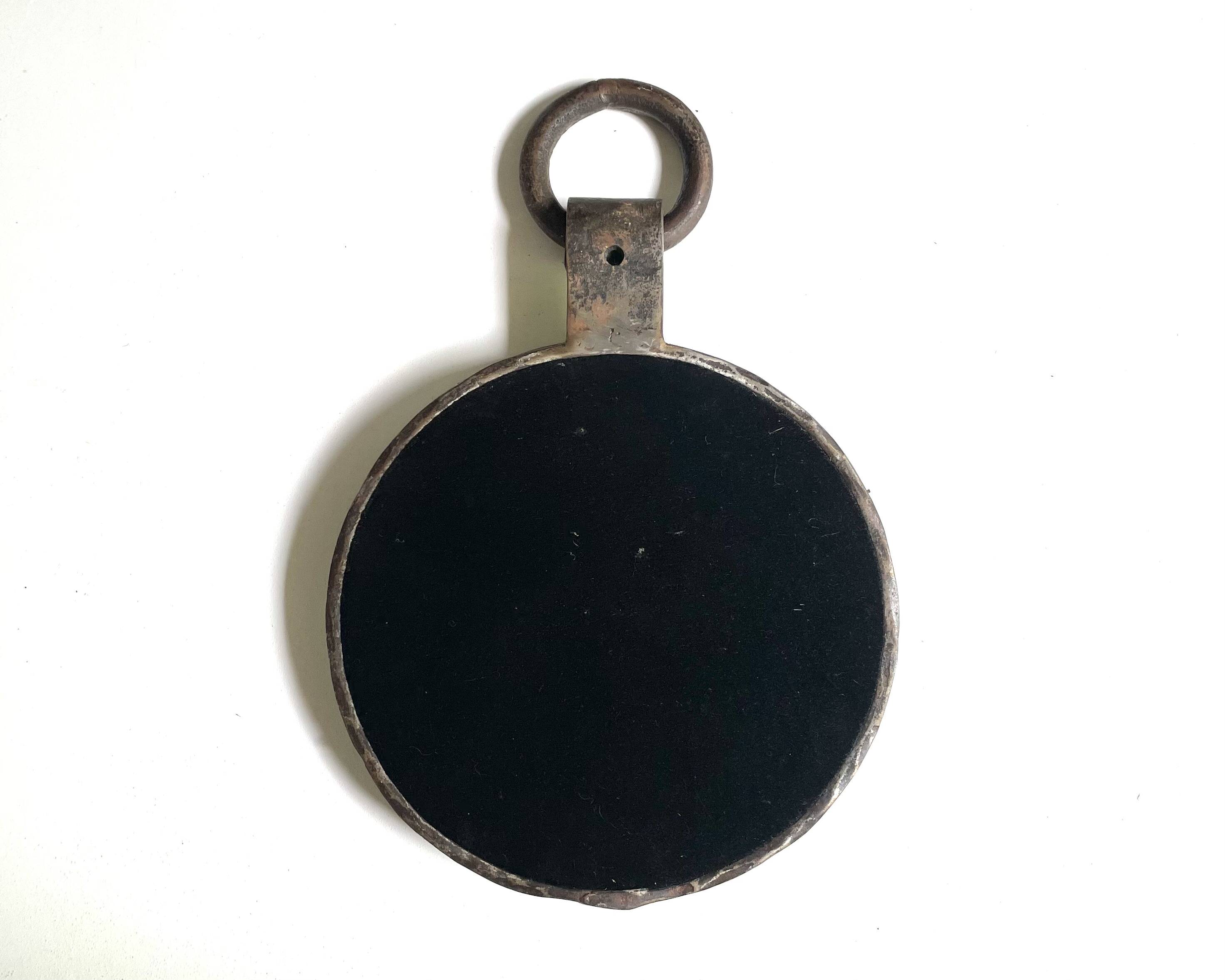 Round cast iron mirror with ring, 1950s