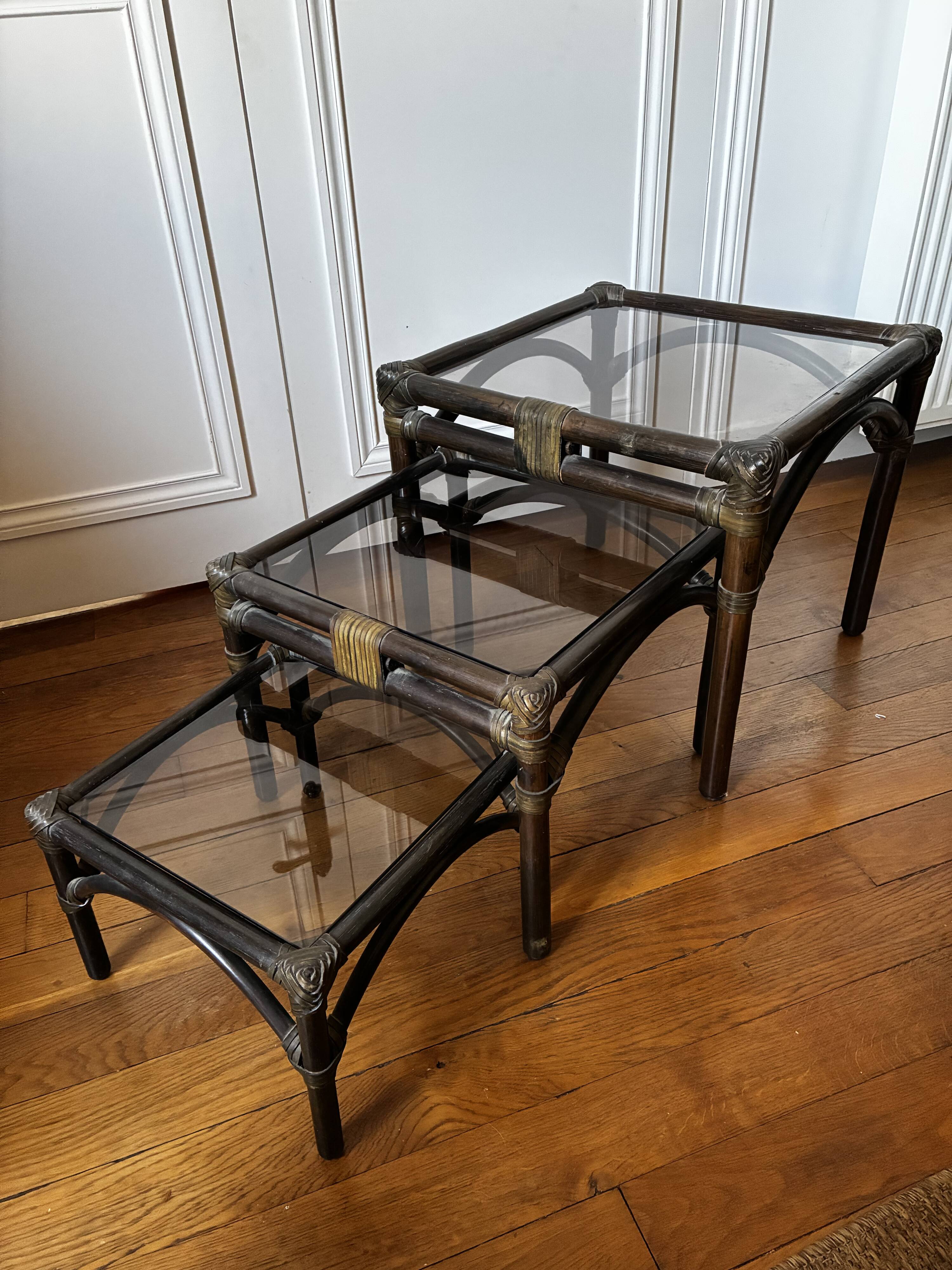 Bamboo and smoked glass nesting coffee tables