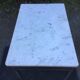Vintage table with square chrome tubular metal base and marble top.