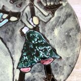 Musicians ceramic dish, signed