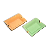 Pair of vintage ashtrays in glazed ceramic and golden orange and green