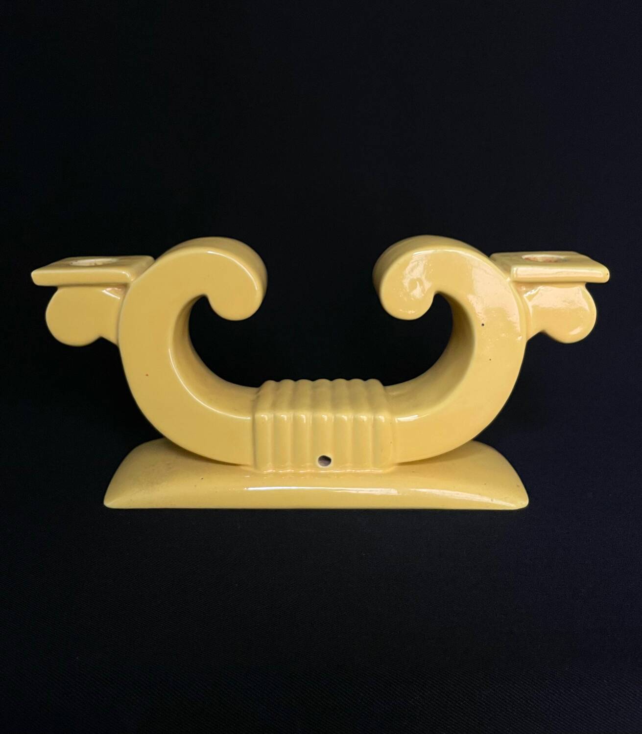 Pair of Saint Clement candlesticks