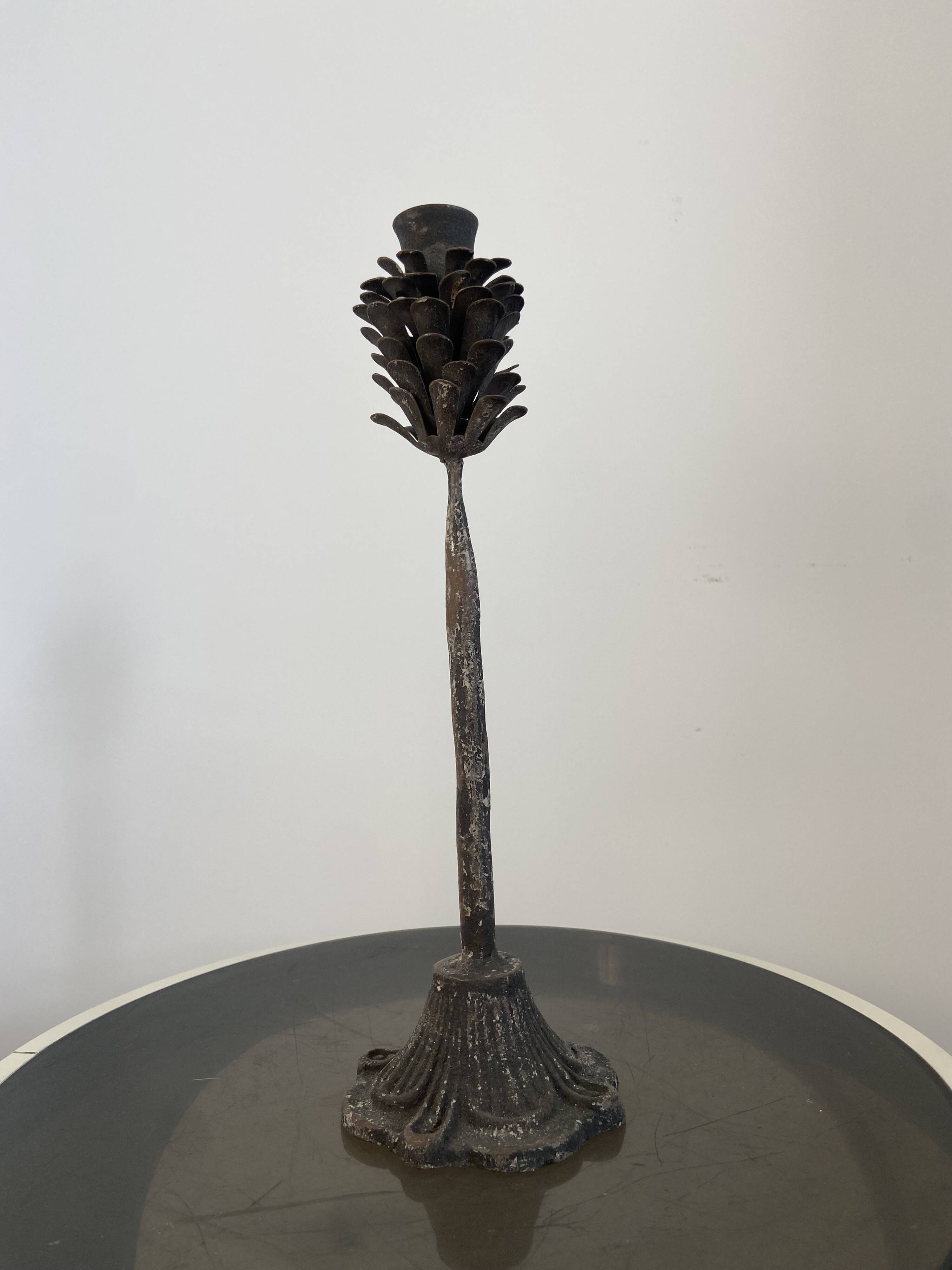 Metal pine cone candle holder