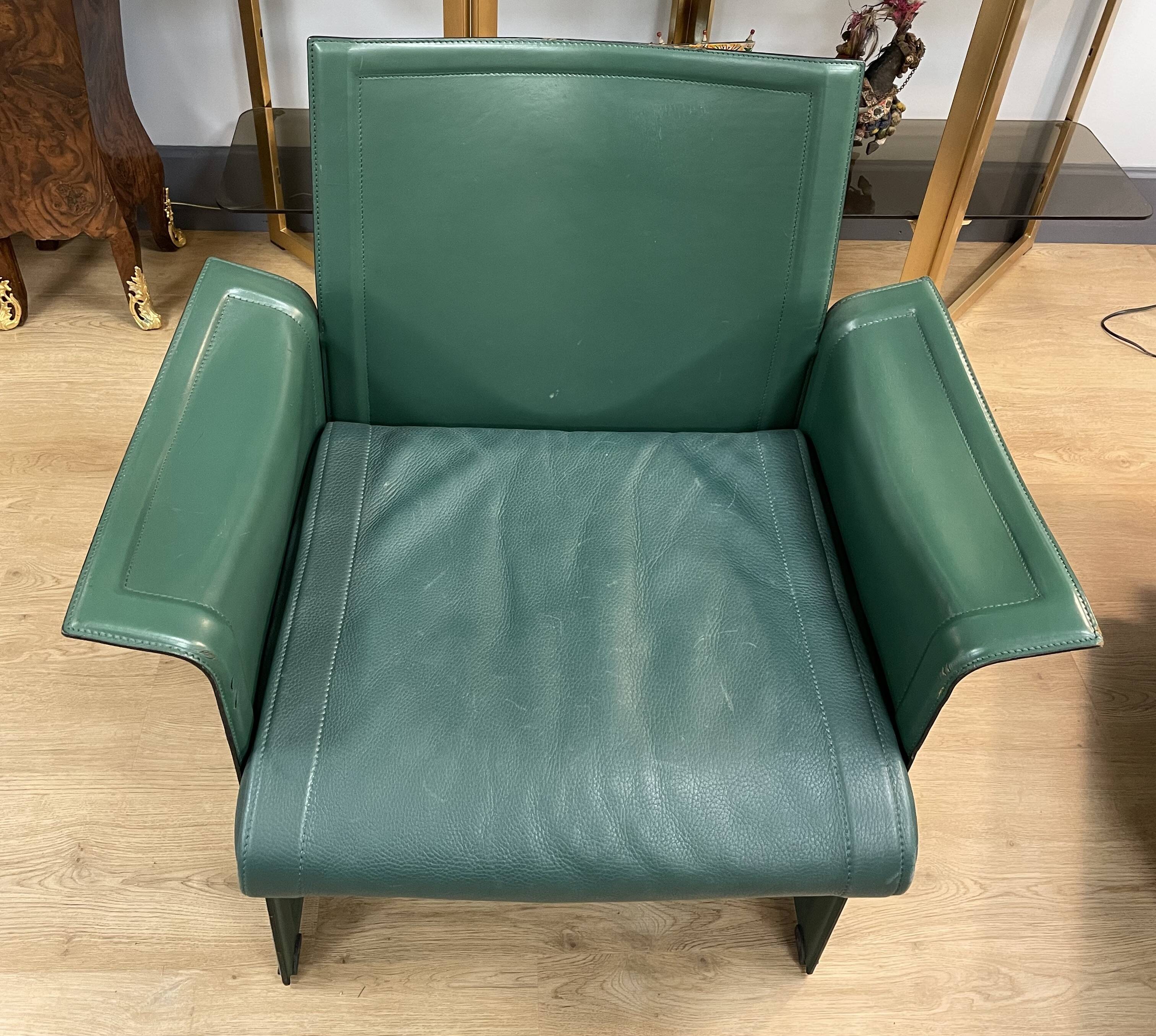Pair of green leather armchairs from the 70s