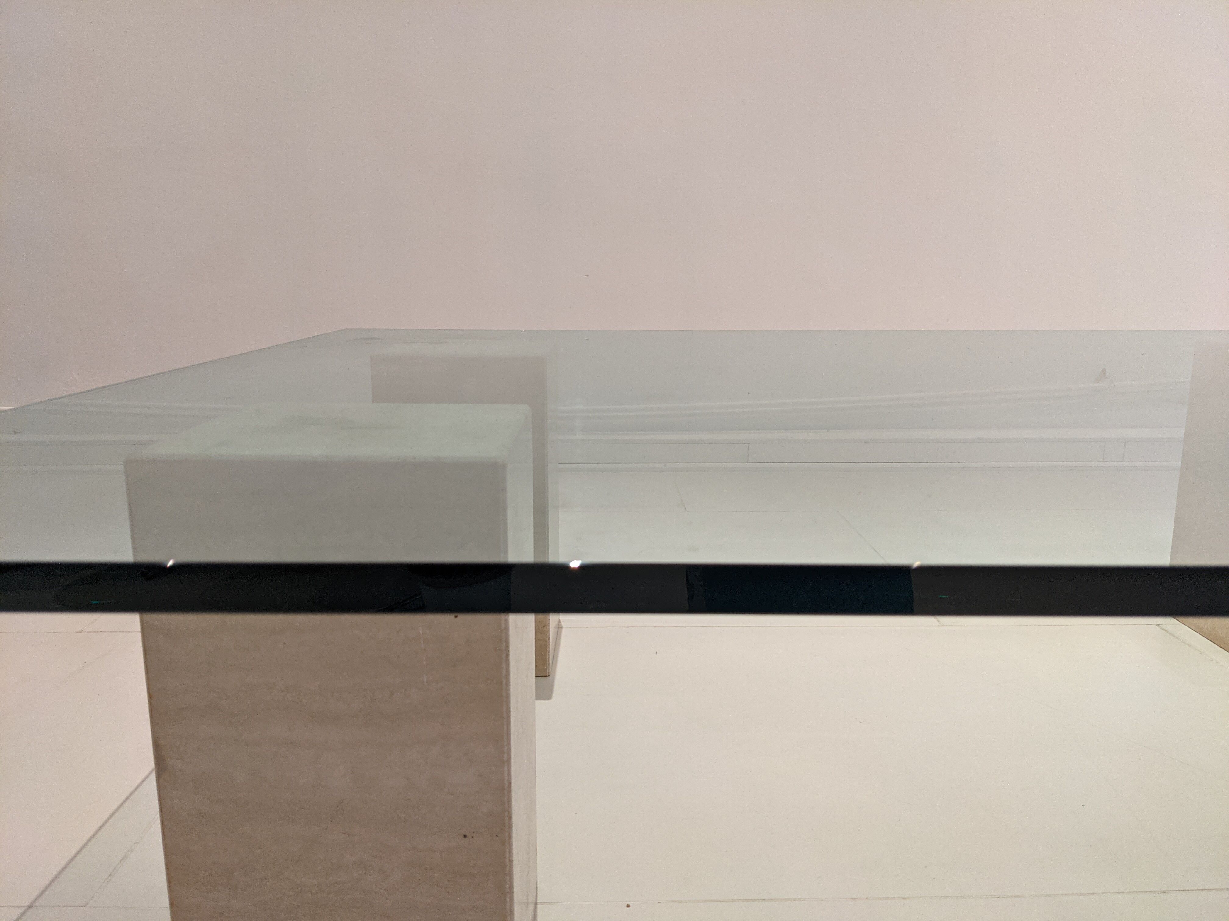 Glass table and travertine feet