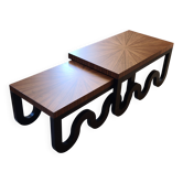 Nest of coffee tables in lacquer and rosewood veneer.