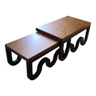 Nest of coffee tables in lacquer and rosewood veneer.