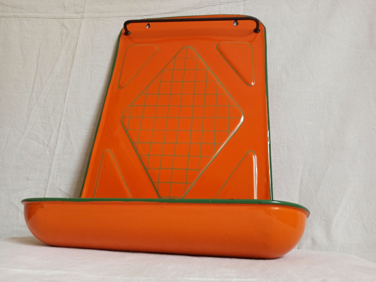Orange enamelled kitchen utensil door