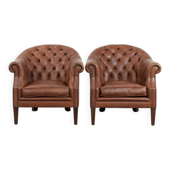 Set of two cognac-coloured Chesterfield club armchairs