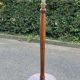 Vintage round wooden floor lamp with beige lampshade