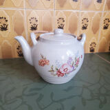 Teapot with flower and wooden handle