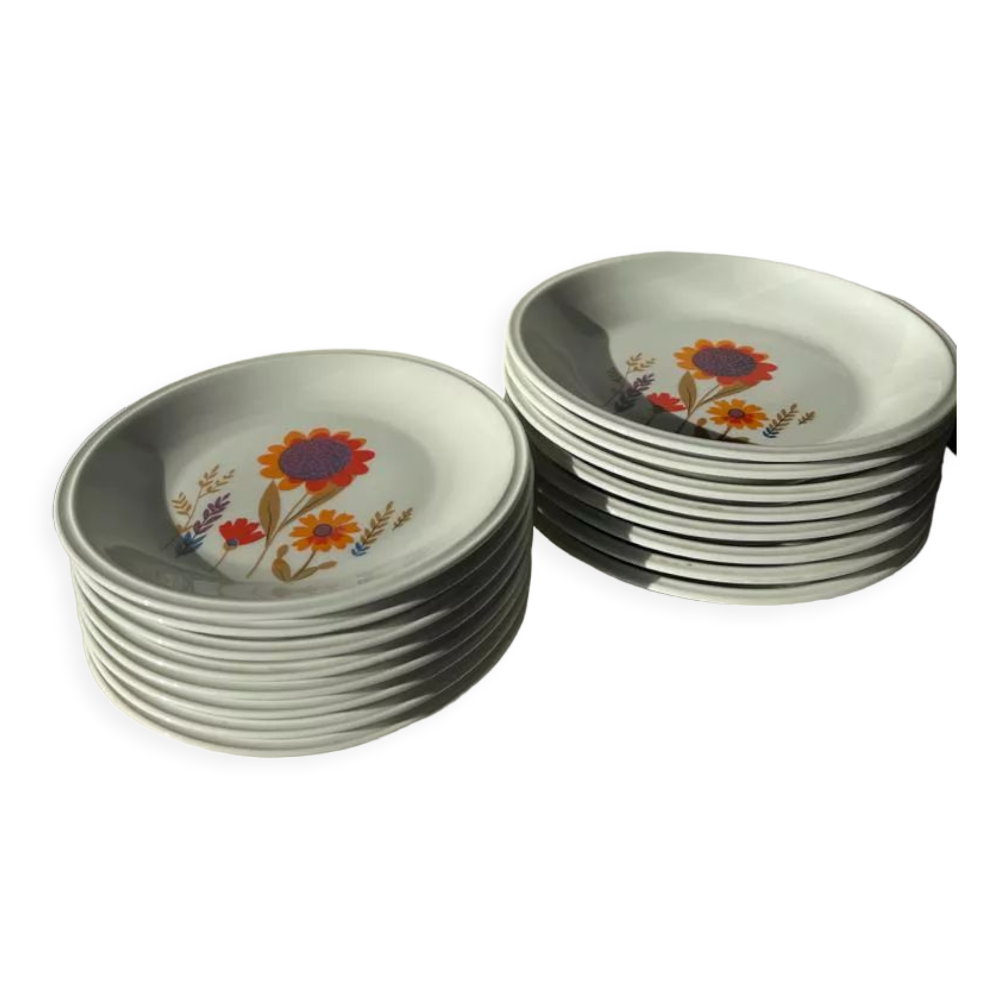 Ensemble vintage d'assiettes porcelaine de Sologne à motif floral stylisé