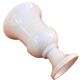 Vase on a pedestal, glazed white ceramic.