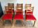 Suite de 6 chaises en chêne et assises de velours rouge