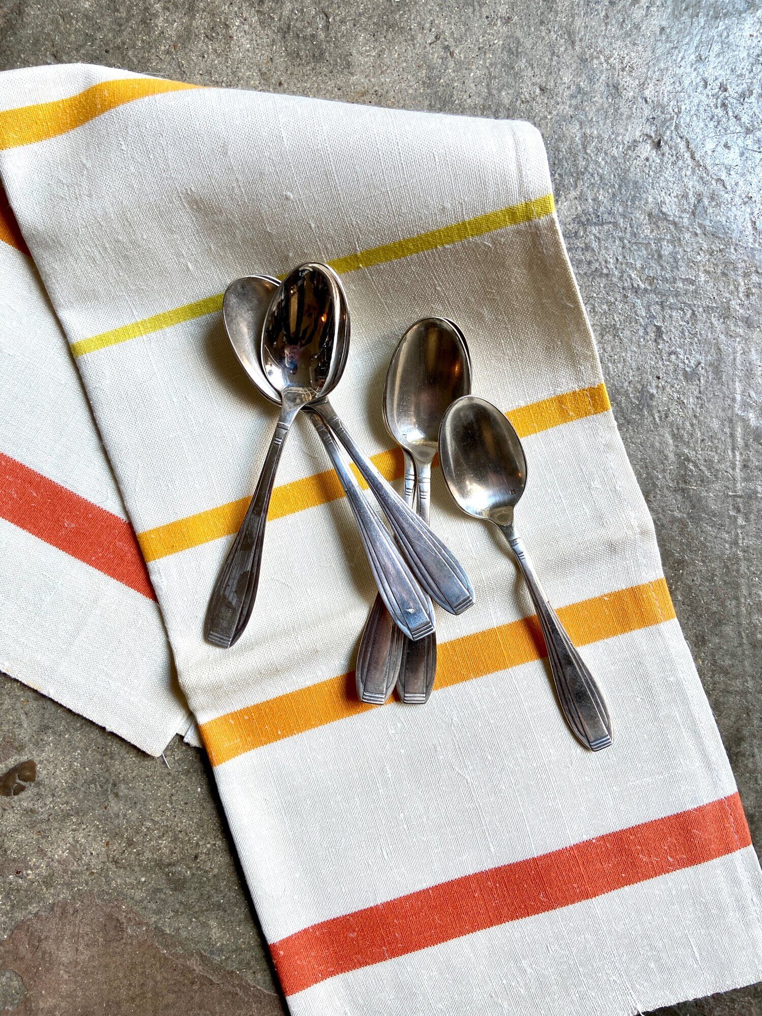6 silver metal spoons