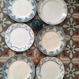 Together six dinner plates old mismatched bluish green.