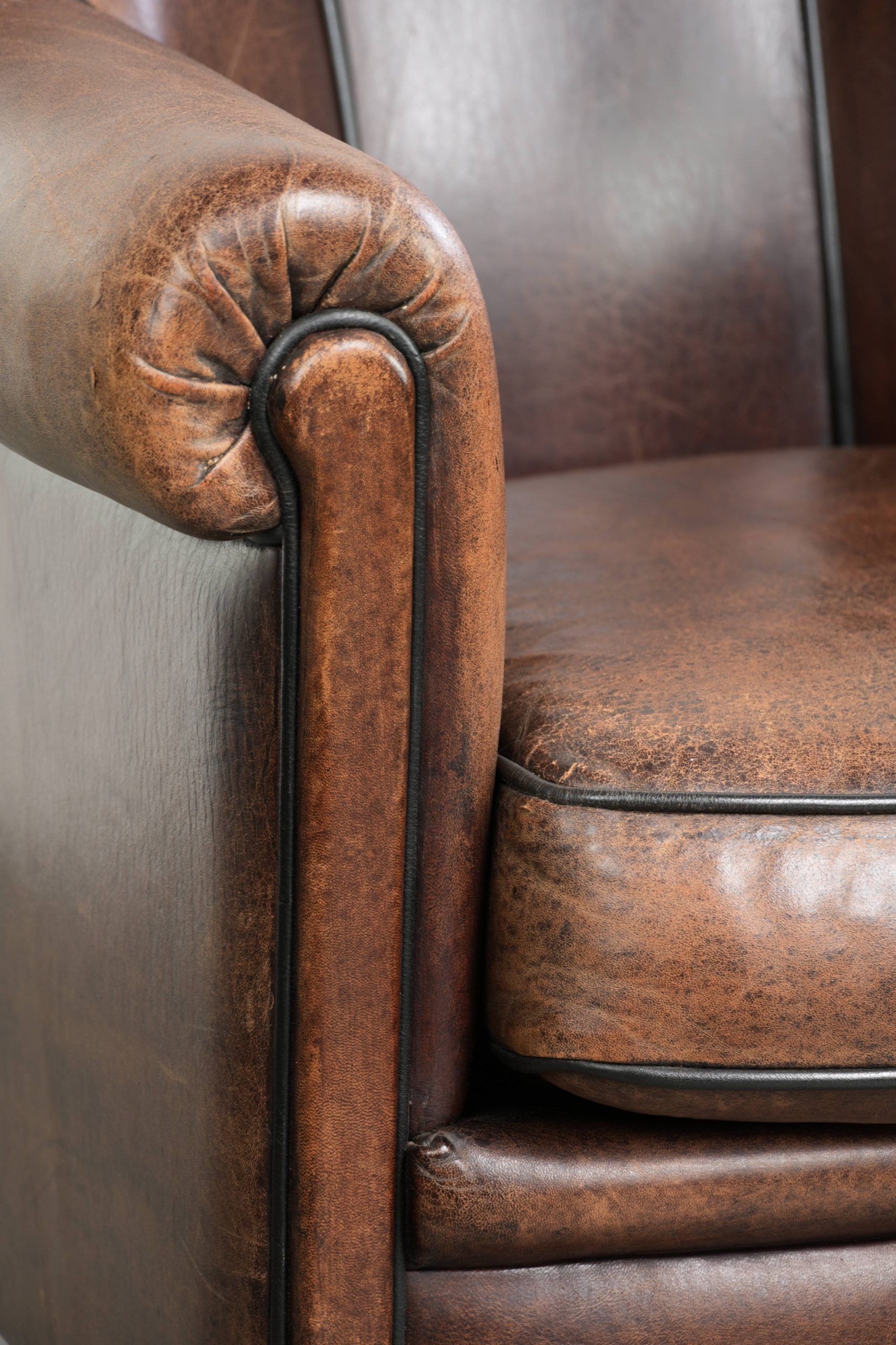 Vintage sheepskin armchair with a unique design and timeless appearance