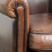 Vintage sheepskin armchair with a unique design and timeless appearance
