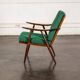 Boomerang chair in green fabric