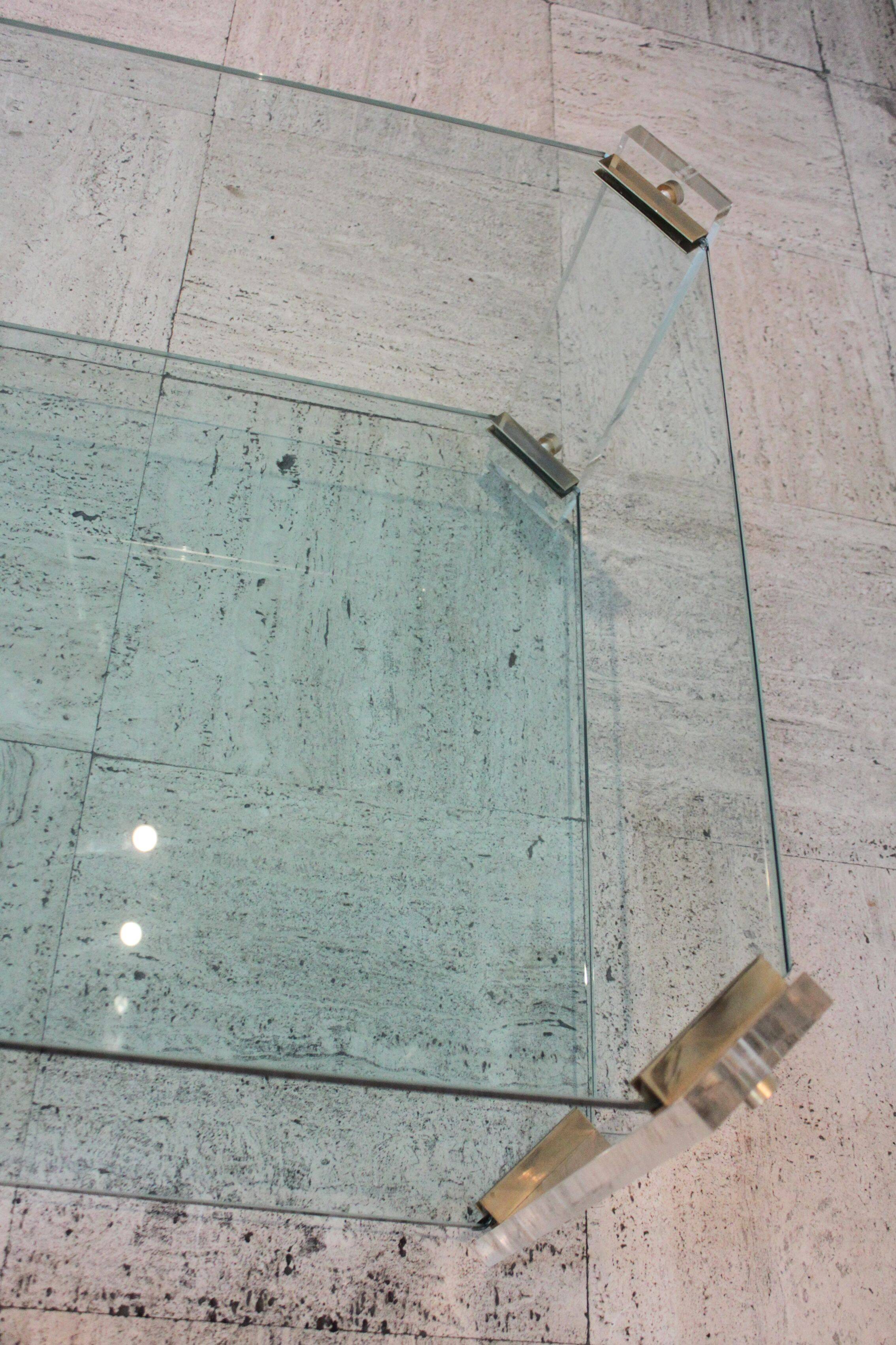 Glass and brass coffee table, Hollywood Regency style, 70's.