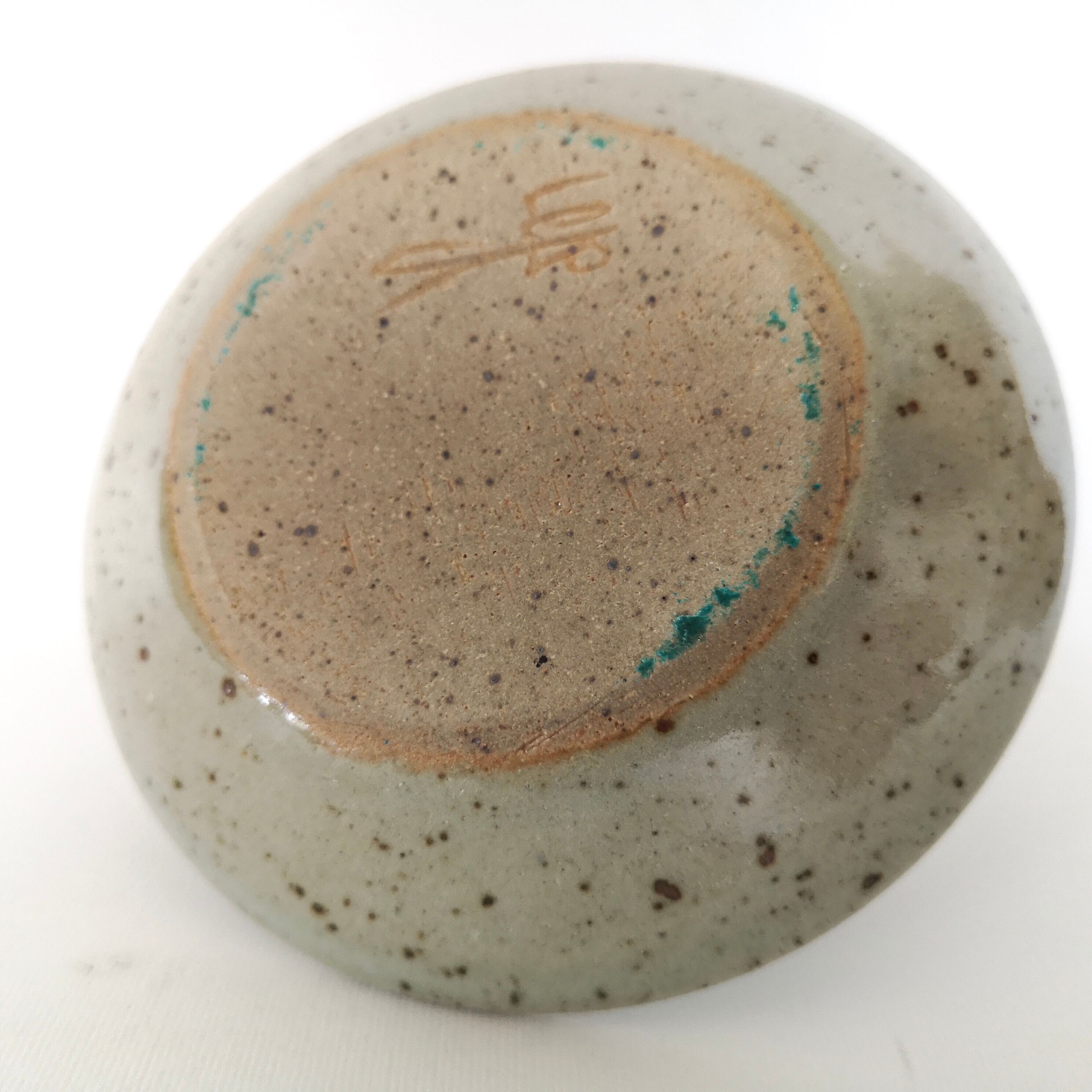 Enamelled sandstone candlestick