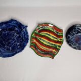 Suite of decorative plates empty enamelled terracotta pockets signed "Gerlou", unique pieces