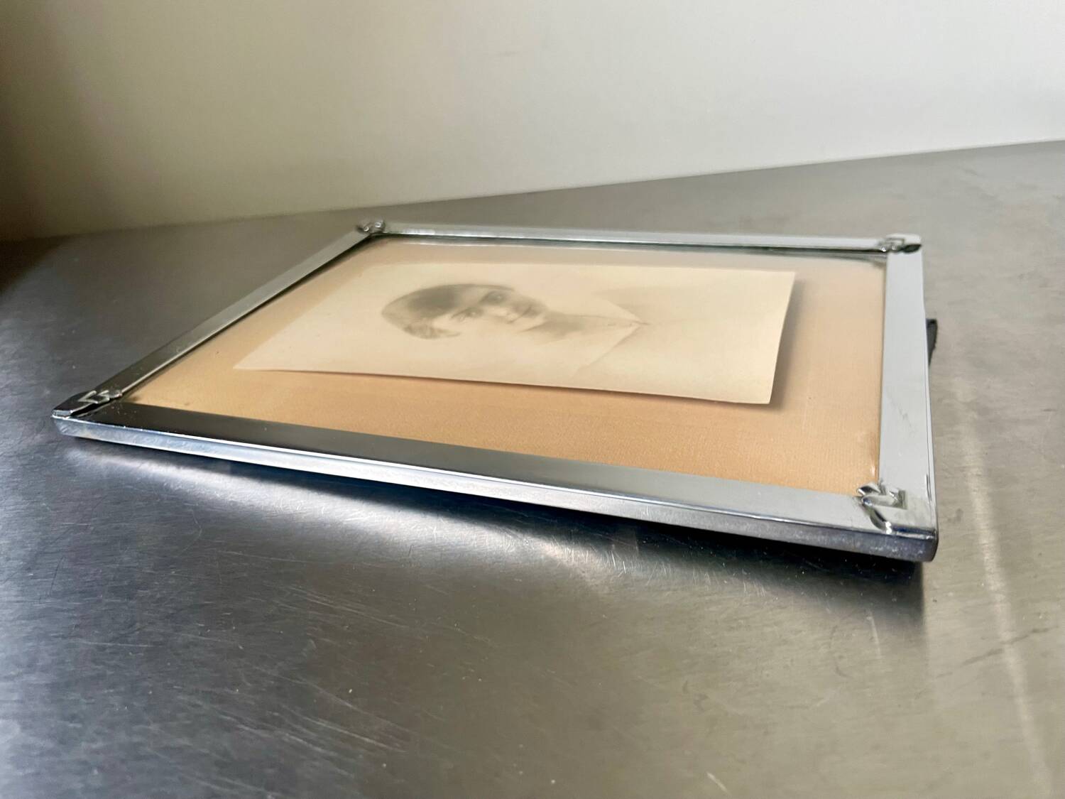 Art deco silver colored  metal frame  20.5  cm x 15.5 cm convex glass