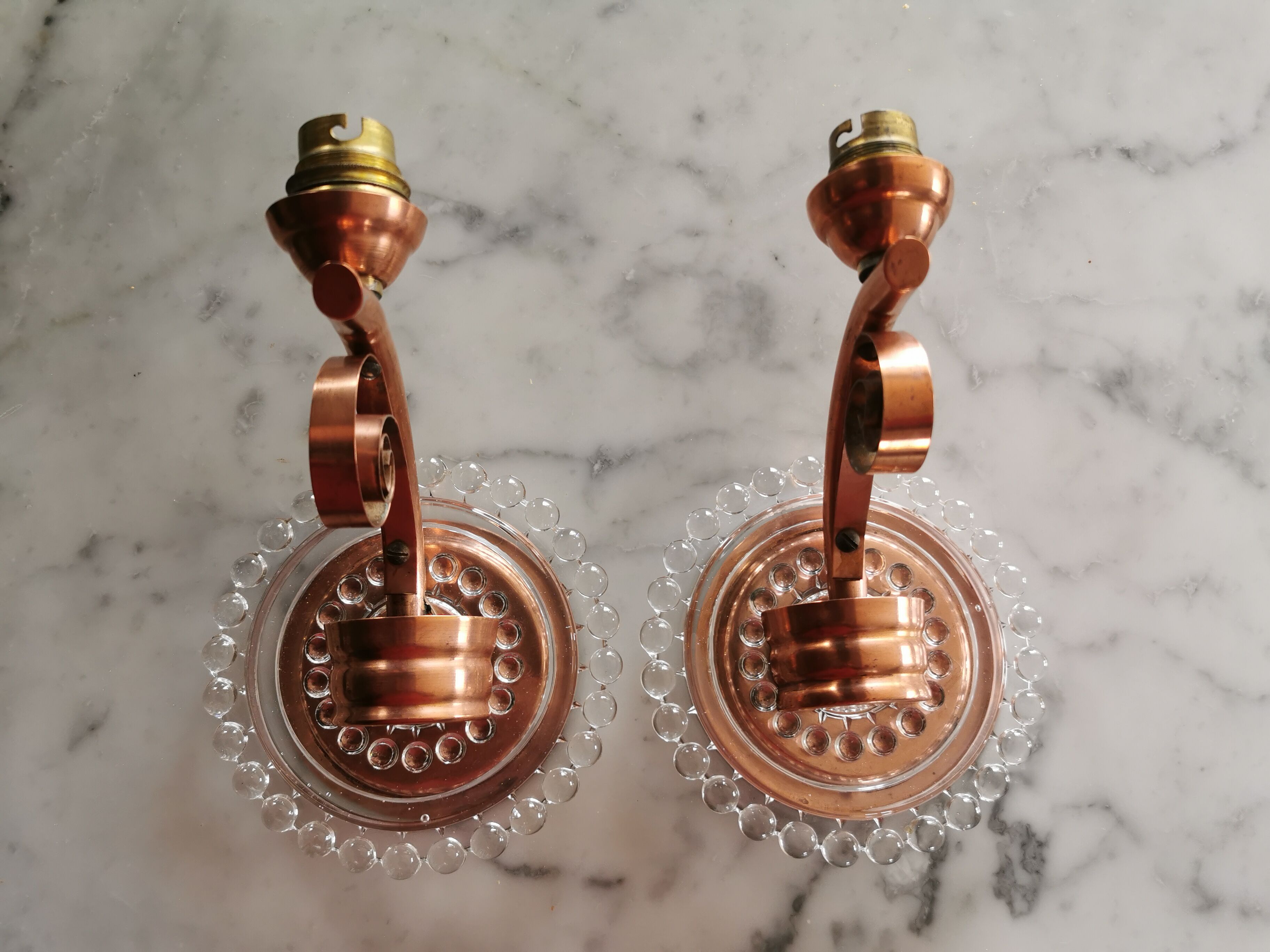 Pair of art deco wall light in glass and copper