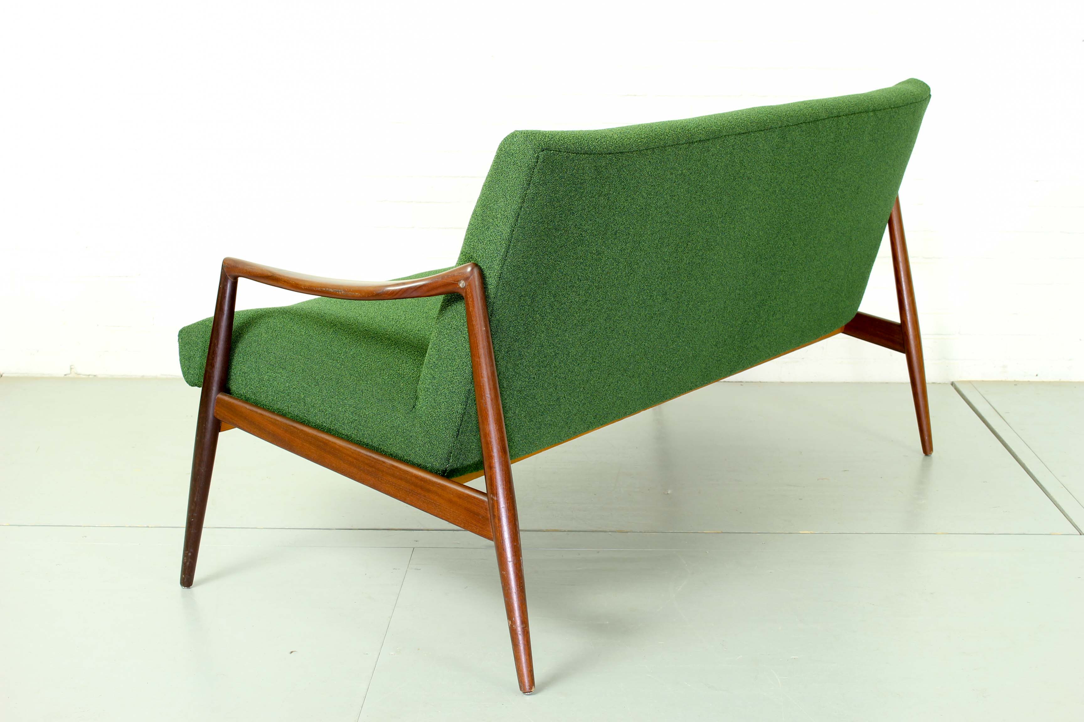 Dutch mid century 2-seater sofa with  teak legs and armrests