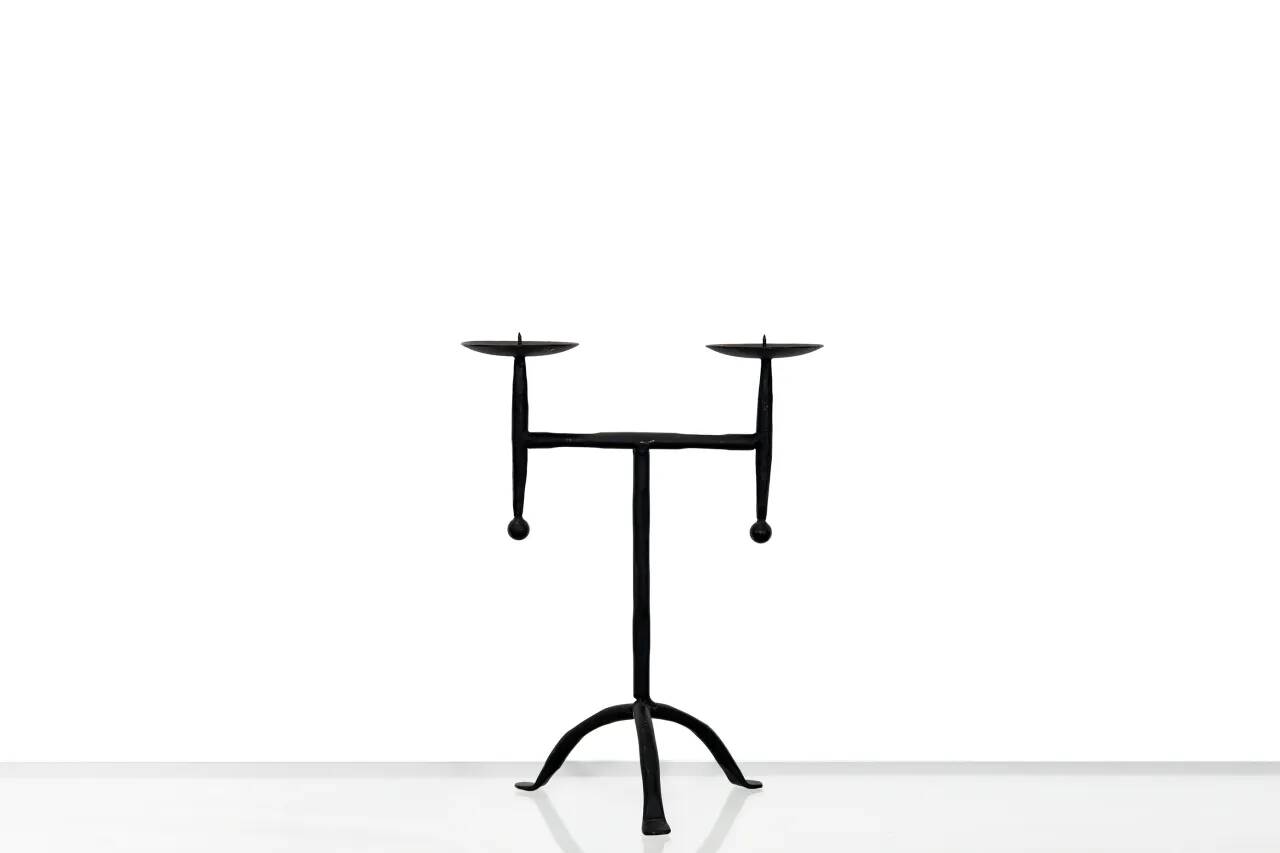 Cast iron tripod candlestick