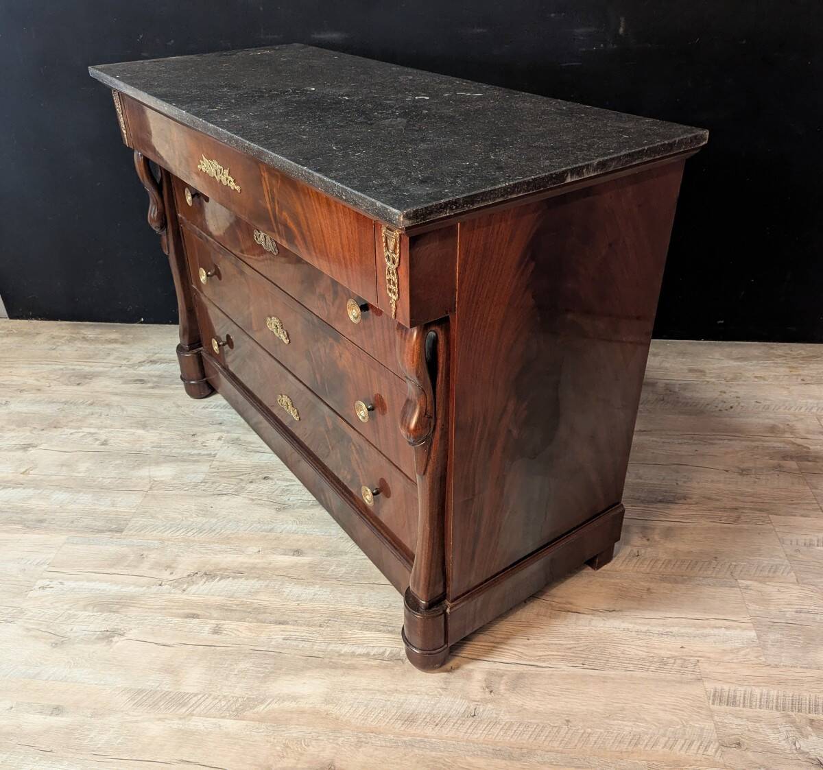 Mahogany chest of drawers with swan decoration