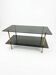 Smoked glass and brass coffee table from the 1970s.
