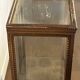 Counter display cabinet in wood and glass in Louis XVI style, 19th century.