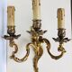 Wall light in gilded bronze