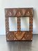 Double frame intricately carved wood