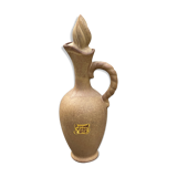 Pitcher with sandstone cap