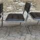 Four vintage chairs from the 1960s and 1970s, chrome with faux leather.