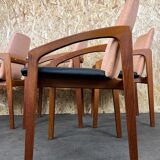 Teak dining chairs model 23 by Henning Kjaernulf for Korup Stolefabric