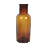 Rummaging in brown glass bottle