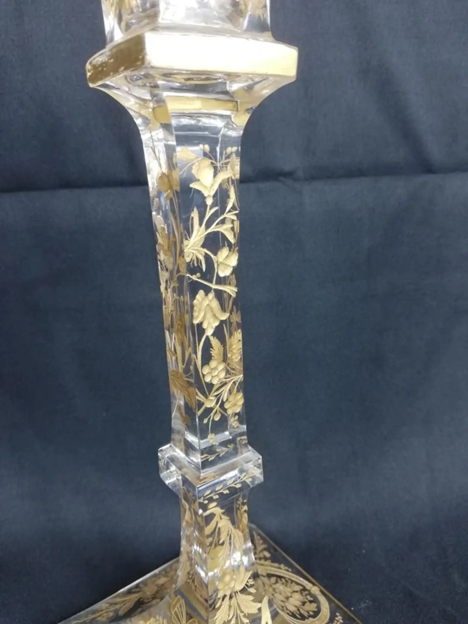 Antique glass candle holder, engraved and gilded.