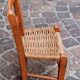 Small chair for children, folk art, wood and straw.