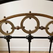 Old Art Nouveau lamp in black metal and brass.