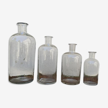 Series of 4 old bottles of herbalist