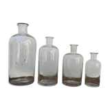 Series of 4 old bottles of herbalist