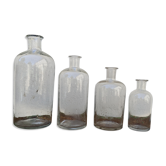 Serie de 4 flacons anciens d'herboriste