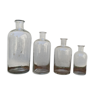 Series of 4 old bottles of herbalist