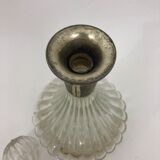 Large glass decanter and tin ring