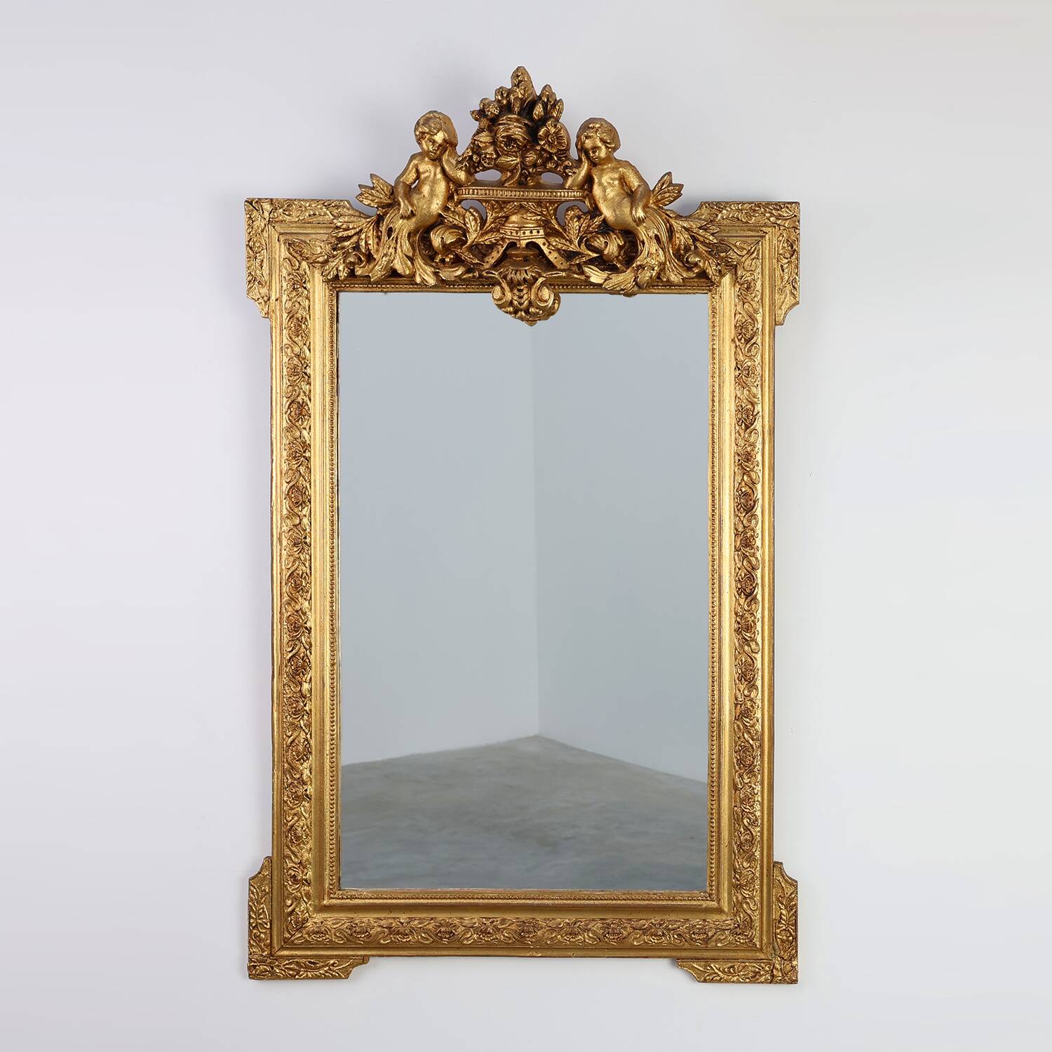 French rococo style richly sculpted gilted oak mirror, 19th century